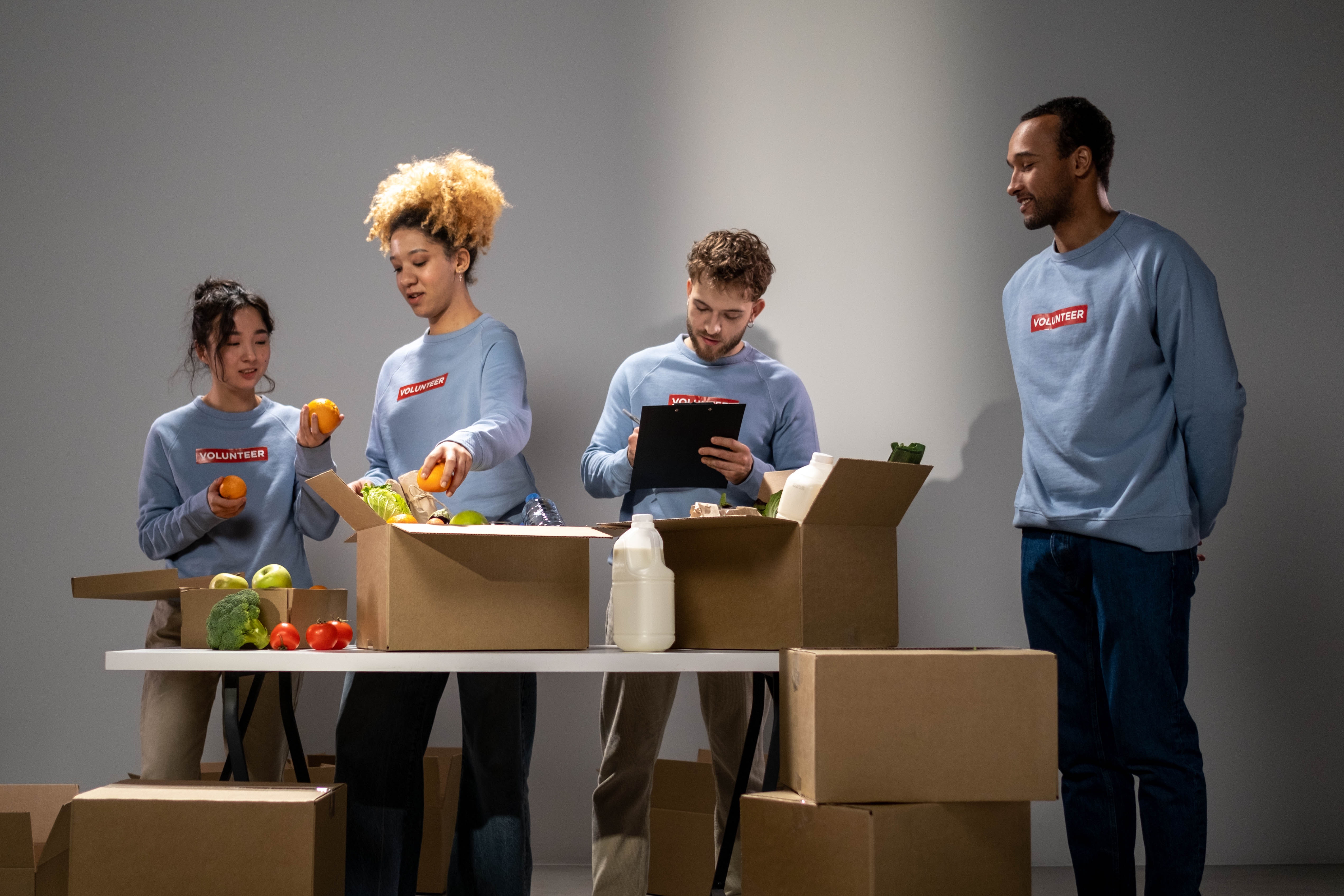 community service volunteers sorting food